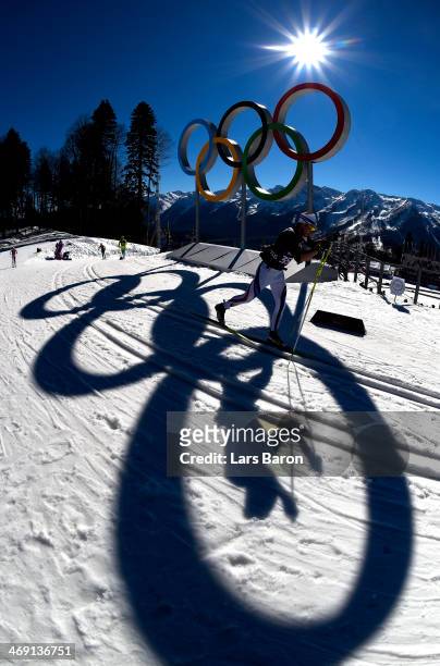 Athletes warm up before the Women's 10 km Classic during day six of the Sochi 2014 Winter Olympics at Laura Cross-country Ski & Biathlon Center on...