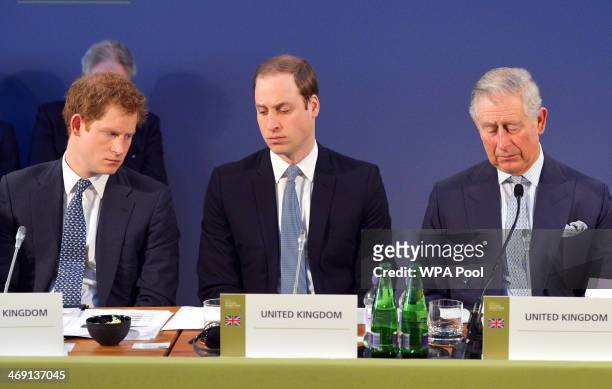 Prince Harry, Prince William, Duke of Cambridge and Prince Charles, Prince of Wales listen to speeches by foreign leaders at the Illegal Wildlife...
