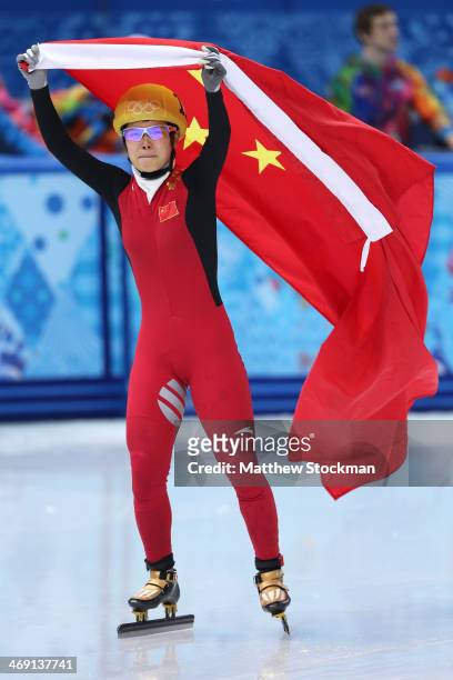 Jianrou Li of China celebrates as she wins the gold medal in the Short Track Speed Skating Ladies' 500 m Final on day 6 of the Sochi 2014 Winter...