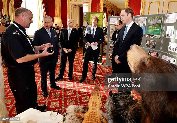 Prince Harry, Prince William, Duke of Cambridge, Prince Charles, Prince of Wales and Foreign Secretary William Hague attend the Illegal Wildlife...