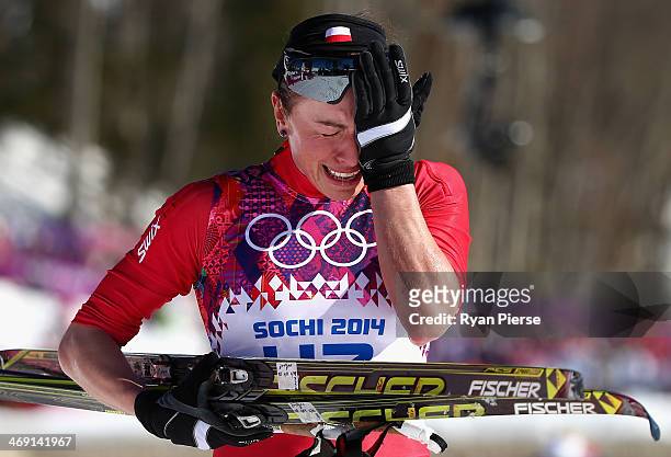 Justyna Kowalczyk of Poland reacts after crossing the finish line during the Ladies' 10km Classic Cross-Country during day six of the Sochi 2014...