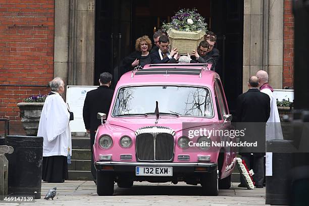 The coffin is carried to the hearse at the funeral of Roger Lloyd-Pack at St Paul's Church in Covent Garden on February 13, 2014 in London, England.