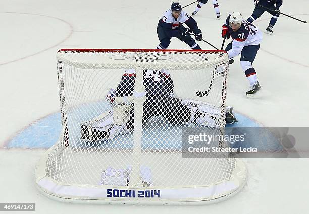 Paul Stastny of United States scores a goal against Jaroslav Halak of Slovakia in the second period during the Men's Ice Hockey Preliminary Round...