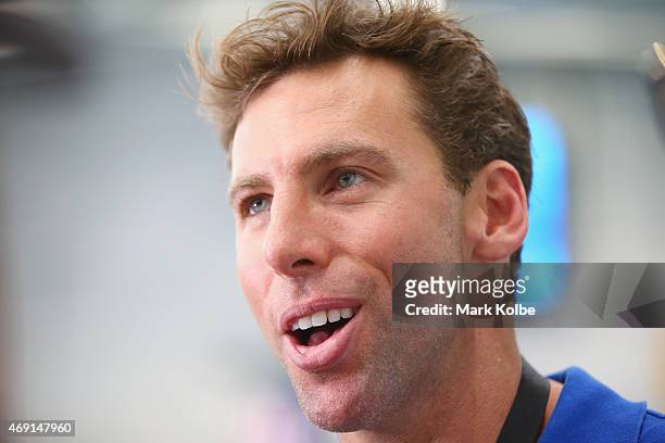 Grant Hackett speaks to the media on pool deck during day eight of the Australian National Swimming Championships at Sydney Olympic Park Aquatic...
