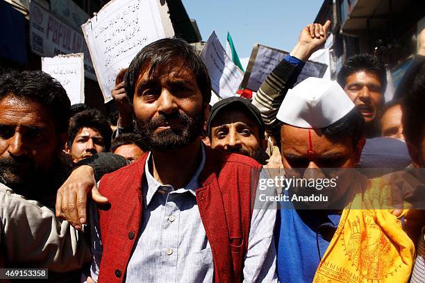 Chairman Yasin Malik and Kashmiri Pandits lead a protest rally against the separate townships for Kashmiri Pandits on April 10, 2015 in Srinagar, the...