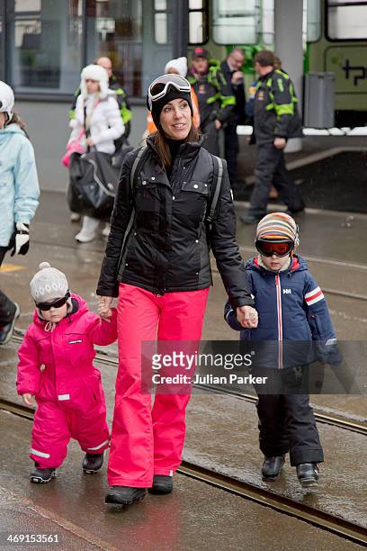 Princess Marie of Denmark, Princess Athena and Prince Henrik pose during their annual winter family holiday photocall on February 13, 2014 in...