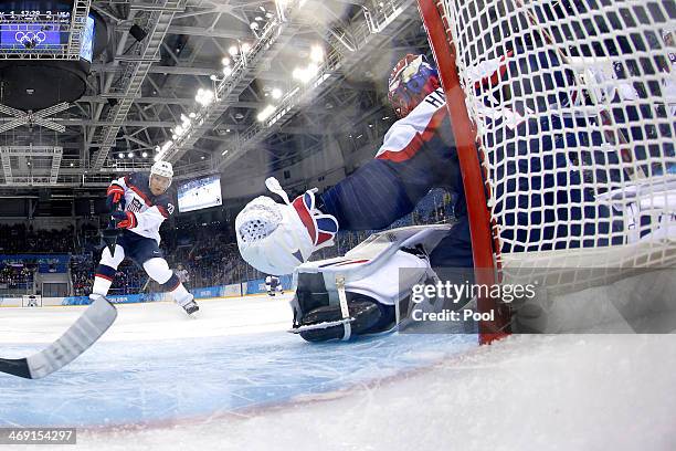 Paul Stastny of United States scores a goal against Jaroslav Halak of Slovakia during the Men's Ice Hockey Preliminary Round Group A game on day six...