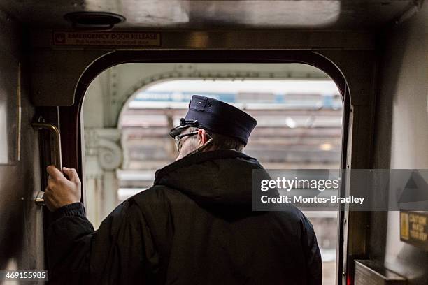 conductor on departure - amtrak brand name stock pictures, royalty-free photos & images