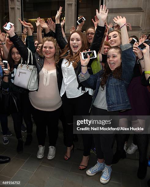 Tanya Burr greets fans outside Waterstones Piccadilly ahead of her book 'Love Tanya' signing on April 10, 2015 in London, England.