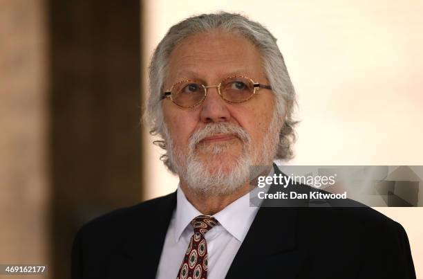 Dave Lee Travis leaves Southwark Crown Court after being found not guilty of 12 counts of indecent assault, on February 13, 2014 in London, England....