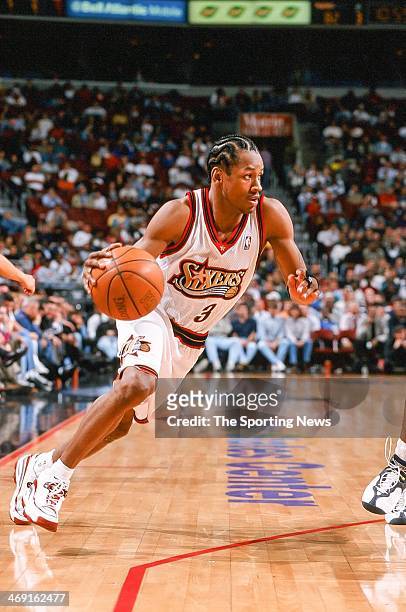 Allen Iverson of the Philadelphia 76ers moves the ball during the game against the Charlotte Hornets on April 8, 1998 at CoreStates Center in...