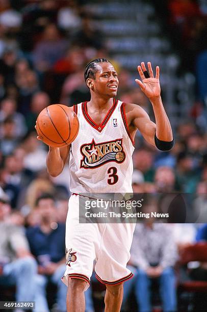 Allen Iverson of the Philadelphia 76ers moves the ball during the game against the Charlotte Hornets on April 8, 1998 at CoreStates Center in...