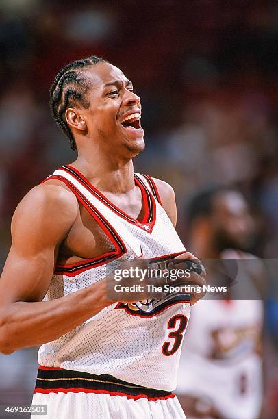 Allen Iverson of the Philadelphia 76ers laughs during the game against the Charlotte Hornets on April 8, 1998 at CoreStates Center in Philadelphia,...