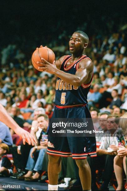 Anthony Goldwire of the Denver Nuggets moves the ball during the game against the Houston Rockets on April 14, 1998 at Compaq Center in Houston,...