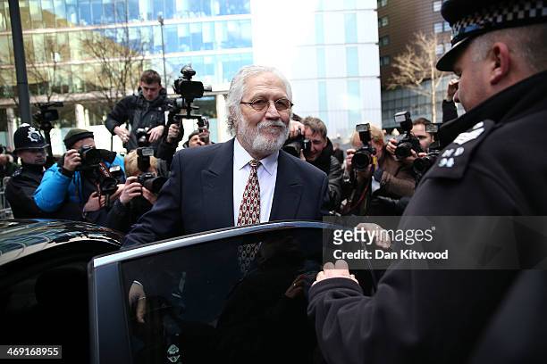 Dave Lee Travis leaves Southwark Crown Court after being found not guilty of 12 counts of indecent assault, on February 13, 2014 in London, England....