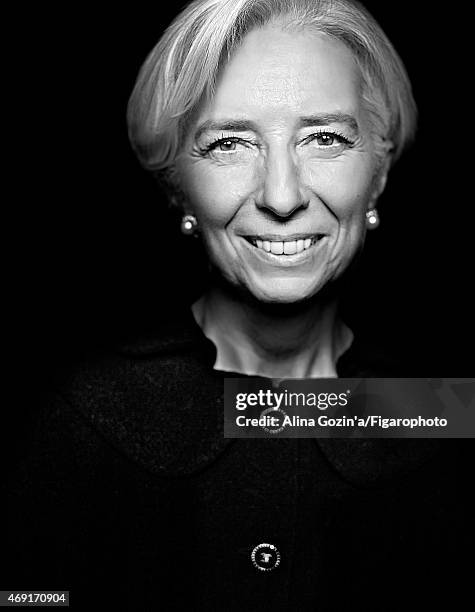 Managing director of the International Monetary Fund, Christine Lagarde is photographed for Madame Figaro on January 13, 2015 in her office in...