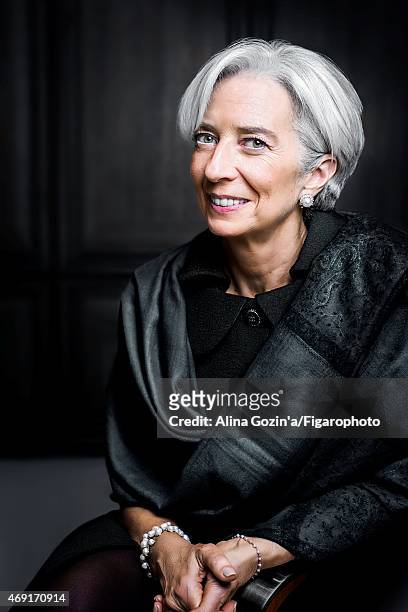 Managing director of the International Monetary Fund, Christine Lagarde is photographed for Madame Figaro on January 13, 2015 in her office in...