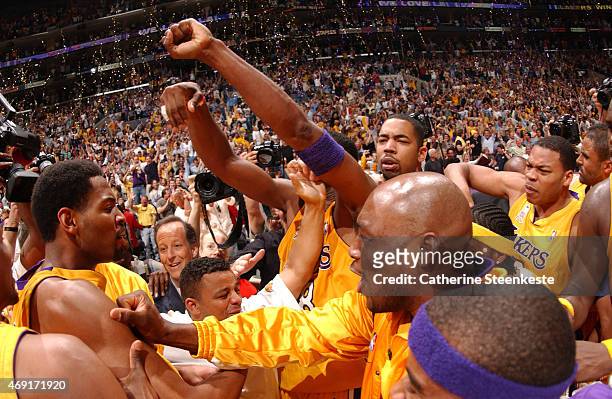 Robert Horry of the Los Angeles Lakers celebrates after hitting the game winning shot against the Sacramento Kings in Game four of the Western...