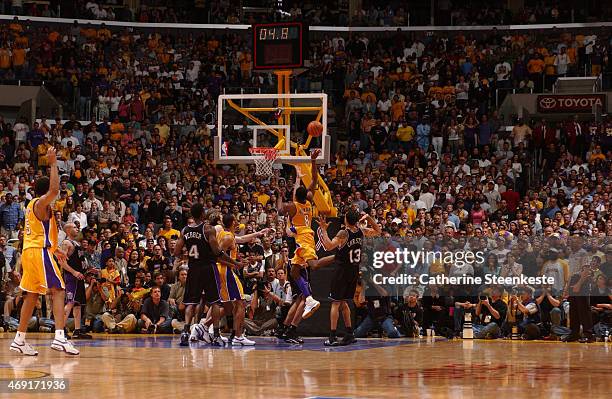 Kobe Bryant of the Los Angeles Lakers goes for the shot right before Robert Horry's game winner against the Sacramento Kings in Game four of the...
