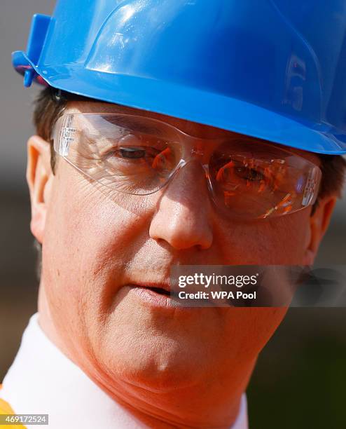 Prime Minister David Cameron during a visit to the construction of a new sea defence on April 10, 2015 in Dawlish, United Kingdom. Mr Cameron is...