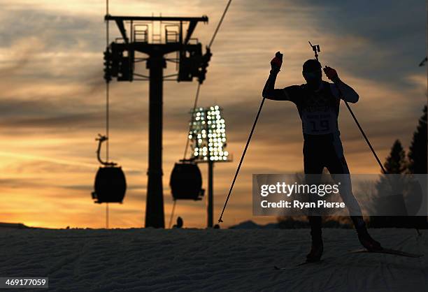 Dominik Landertinger of Austria competes during the Men's 20km Indvidual Biathlon during day six of the Sochi 2014 Winter Olympics at Laura...