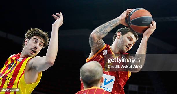 Vladimir Micov, #5 of Galatasaray Liv Hospital Istanbul competes with Ante Tomic, #44 of FC Barcelona during the Turkish Airlines Euroleague...