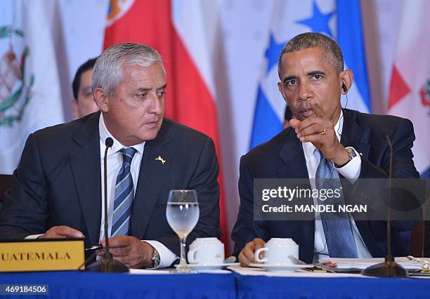 President Barack Obama speaks during a meeting with members of the Central American Integration System , beside Guatemala's President Otto Perez...