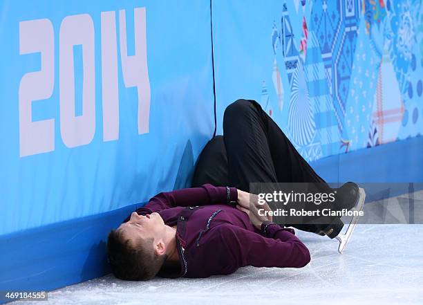 Jeremy Abbott of the United States hits the wall while competing during the Men's Figure Skating Short Program on day 6 of the Sochi 2014 Winter...