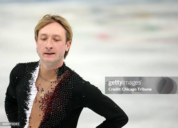 Russias Evgeny Plushenko withdraws from the men's short program figure skating at the Iceberg Skating Palace during the Winter Olympics in Sochi,...