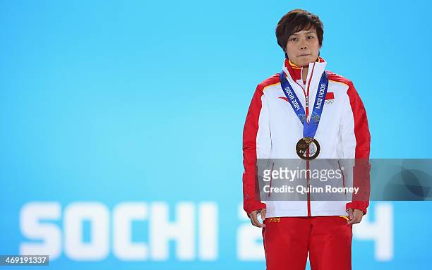 Gold medalist Jianrou Li of China celebrates during the medal ceremony for the Short Track Speed Skating Ladies' 500 m on day six of the Sochi 2014...