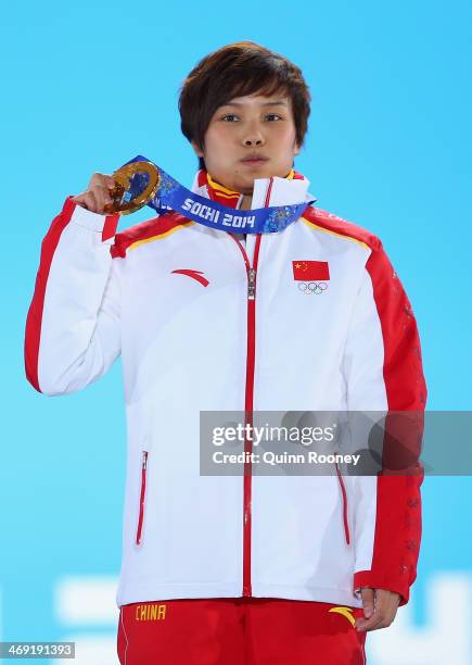 Gold medalist Jianrou Li of China celebrates during the medal ceremony for the Short Track Speed Skating Ladies' 500 m on day six of the Sochi 2014...