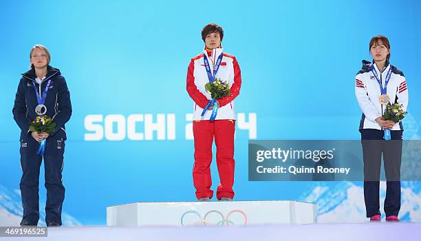 Silver medalist Arianna Fontana of Italy, gold medalist Jianrou Li of China and bronze medalist Seung-Hi Park of Korea celebrate during the medal...