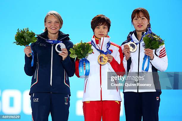 Silver medalist Arianna Fontana of Italy, gold medalist Jianrou Li of China and bronze medalist Seung-Hi Park of Korea celebrate during the medal...