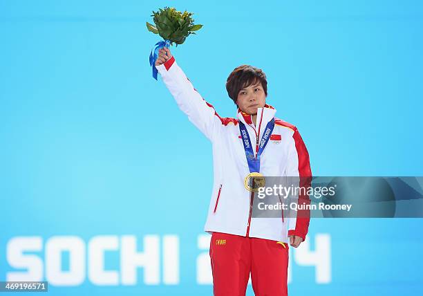 Gold medalist Jianrou Li of China celebrates during the medal ceremony for the Short Track Speed Skating Ladies' 500 m on day six of the Sochi 2014...