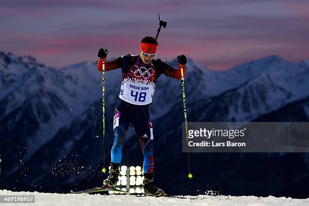 Evgeny Ustyugov of Russia competes in the Men's Individual 20 km during day six of the Sochi 2014 Winter Olympics at Laura Cross-country Ski &...
