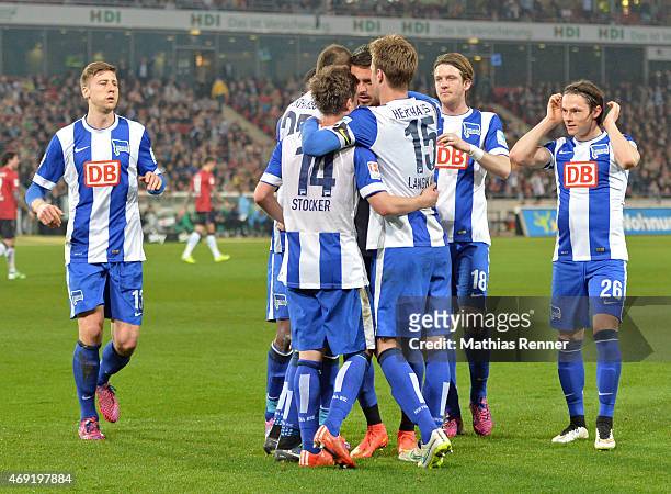 The Hertha team celebrates after scoring the 1:1 during the Bundesliga match between Hannover 96 and Hertha BSC on April 10, 2015 in Hannover,...