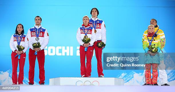 Silver medalists Ksenia Stolbova and Fedor Klimov of Russia, gold medalists Tatiana Volosozhar and Maxim Trankov of Russia, bronze medalists Aliona...