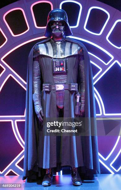 The costume of character Darth Vader from the Star Wars film series is displayed during the presentation of the exhibition "Star Wars Identities" at...