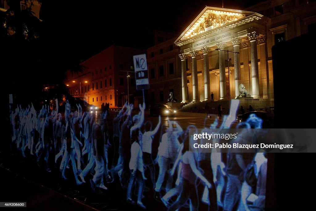 Holographic Protest Against Gag Law At Spanish Parliament