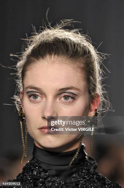 Model walks the runway during the Marchesa Ready to Wear Fall/Winter 2014-2015 show during Mercedes-Benz Fashion Week Fall 2014 on February 12, 2014...