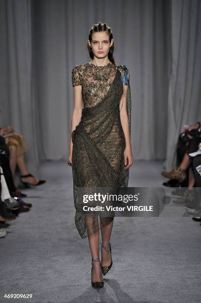 Model walks the runway during the Marchesa Ready to Wear Fall/Winter 2014-2015 show during Mercedes-Benz Fashion Week Fall 2014 on February 12, 2014...