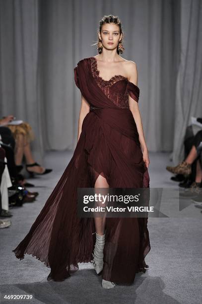 Model walks the runway during the Marchesa Ready to Wear Fall/Winter 2014-2015 show during Mercedes-Benz Fashion Week Fall 2014 on February 12, 2014...