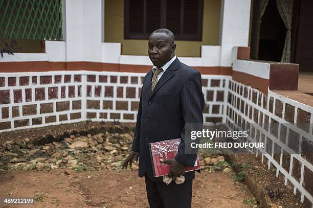 Prefect of the city of Mbaiki Alexandre Kouroupe-Awo, a Christian, poses in Mbaiki, 80km south-west of Bangui, on February 12, 2014. When the...