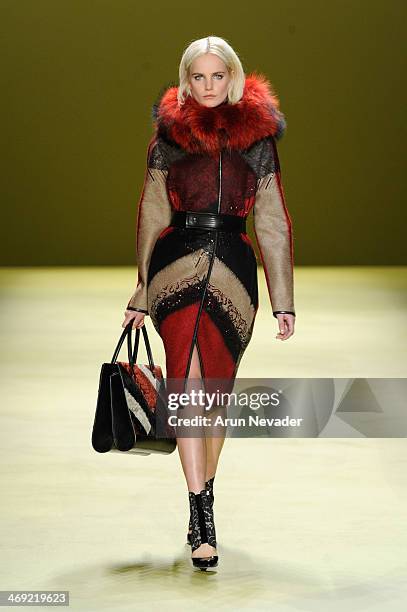 Model walks the runway at the J. Mendel fashion show during Mercedes-Benz Fashion Week Fall 2014 at The Theatre at Lincoln Center on February 13,...