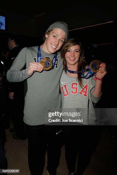 Olympians Joss Christensen and Kaitlyn Farrington visit the USA House in the Olympic Village on February 13, 2014 in Sochi, Russia.