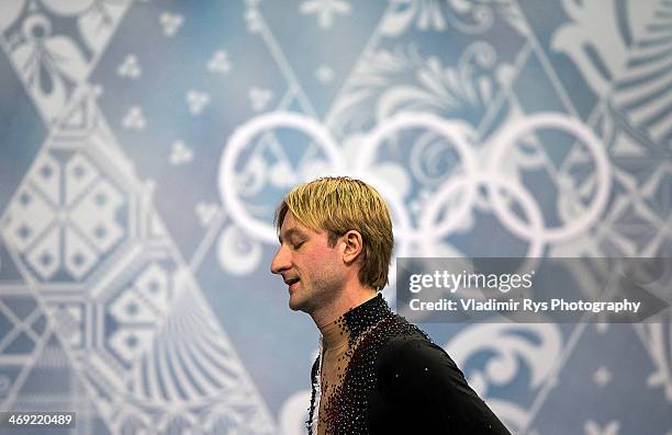 Evgeny Plyushchenko of Russia leaves the stadium after his injury at a warm up during the Men's Figure Skating Short Program on day 6 of the Sochi...