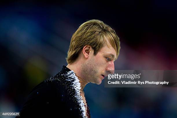 Evgeny Plyushchenko of Russia is seen at at a warm up during the Men's Figure Skating Short Program on day 6 of the Sochi 2014 Winter Olympics at the...
