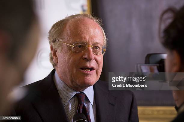 Paolo Scaroni, chief executive officer of Eni SpA, speaks during a news conference following the company's 2014-2017 strategy presentation in London,...