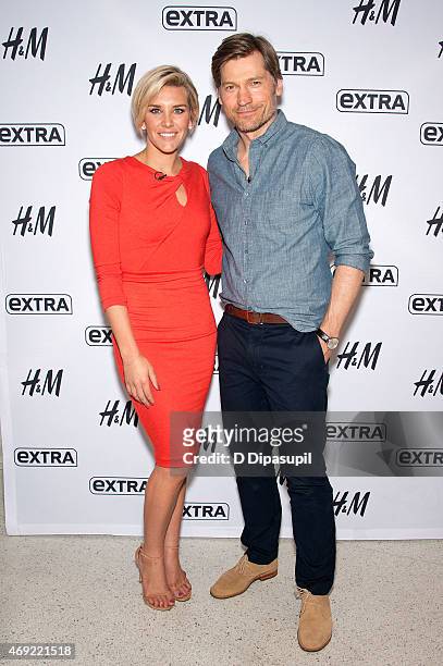 Charissa Thompson interviews Nikolaj Coster-Waldau during his visit to "Extra" at their New York Studios at H&M in Times Square on April 10, 2015 in...