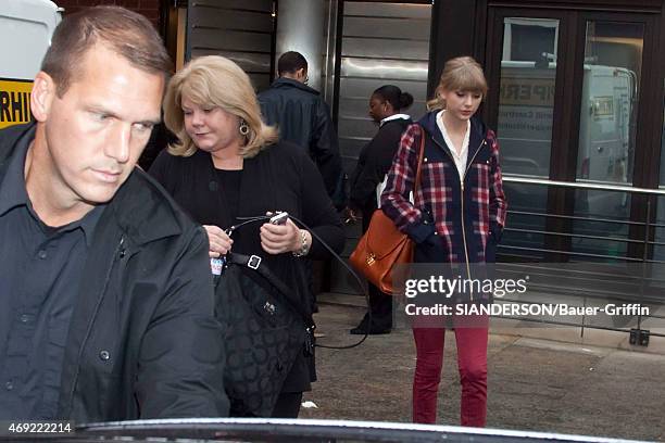 Taylor Swift and her mother Andrea Finlay are seen on October 05, 2012 in London, United Kingdom.